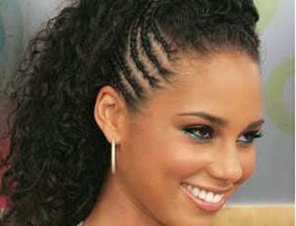 Modelos de penteados afros com tranças raiz nas laterais